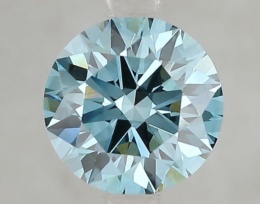 Ideal Loose Diamond - ROUND 2.1ct Fancy Vivid Blue VVS2: Ideal Loose Diamond - ROUND 2.1ct Fancy Vivid Blue VVS2 Source: This is a real non-mined Diamond that has been grown in a lab Shape: ROUND Carats: 2.1 Color: Fancy Vivid Blue Certification: IGI Video: