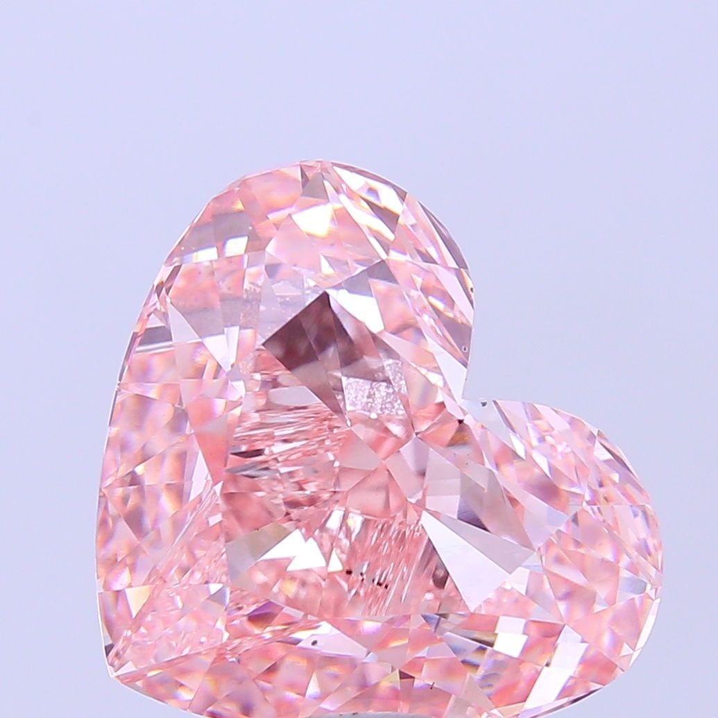 Loose Diamond - HEART 15.11ct Fancy Vivid Pink VS1: Loose Diamond - HEART 15.11ct Fancy Vivid Pink VS1 Source: This is a real non-mined Diamond that has been grown in a lab Shape: HEART Carats: 15.11 Color: Fancy Vivid Pink Certification: IGI Video: