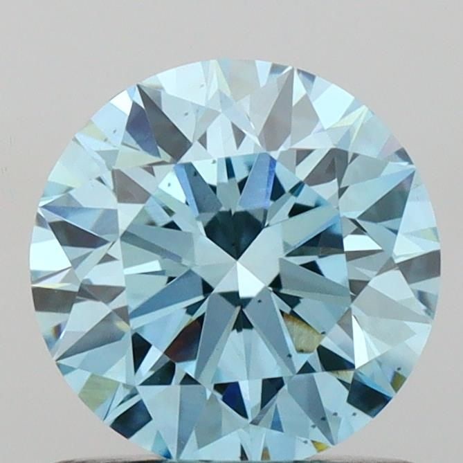 Ideal Loose Diamond - ROUND 0.98ct Fancy Vivid Blue VS2: Ideal Loose Diamond - ROUND 0.98ct Fancy Vivid Blue VS2 Source: This is a real non-mined Diamond that has been grown in a lab Shape: ROUND Carats: 0.98 Color: Fancy Vivid Blue Certification: IGI Video