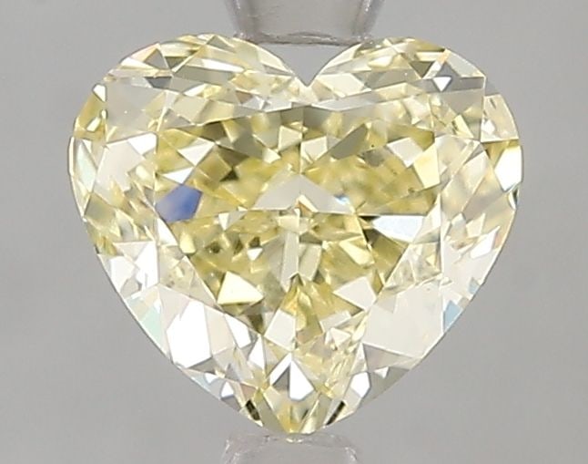 Loose Diamond - HEART 1.51ct Fancy Yellow VS1: Loose Diamond - HEART 1.51ct Fancy Yellow VS1 Source: This is a real non-mined Diamond that has been grown in a lab Shape: HEART Carats: 1.51 Color: Fancy Yellow Certification: IGI Video:
