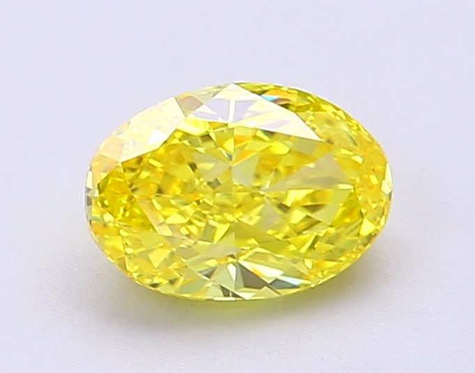 Loose Diamond - OVAL 1.12ct Fancy Vivid Yellow VS1: Loose Diamond - OVAL 1.12ct Fancy Vivid Yellow VS1 Source: This is a real non-mined Diamond that has been grown in a lab Shape: OVAL Carats: 1.12 Color: Fancy Vivid Yellow Certification: IGI Video: