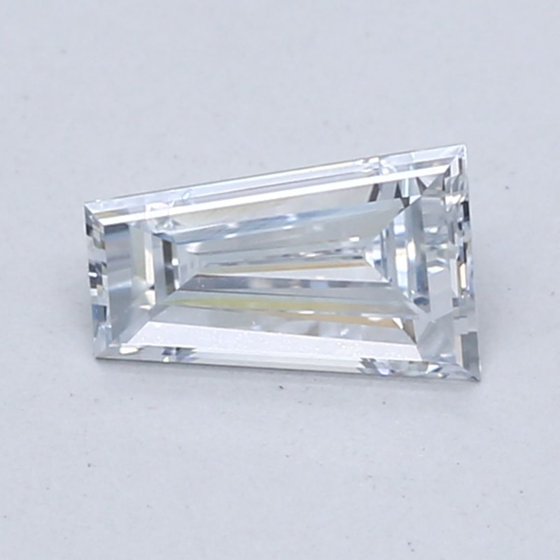 Loose Diamond - TAPERED BAGUETTE 0.72ct Fancy Light Blue VVS2: Loose Diamond - TAPERED BAGUETTE 0.72ct Fancy Light Blue VVS2 Source: This is a real non-mined Diamond that has been grown in a lab Shape: TAPERED BAGUETTE Carats: 0.72 Color: Fancy Light Blue Certifi