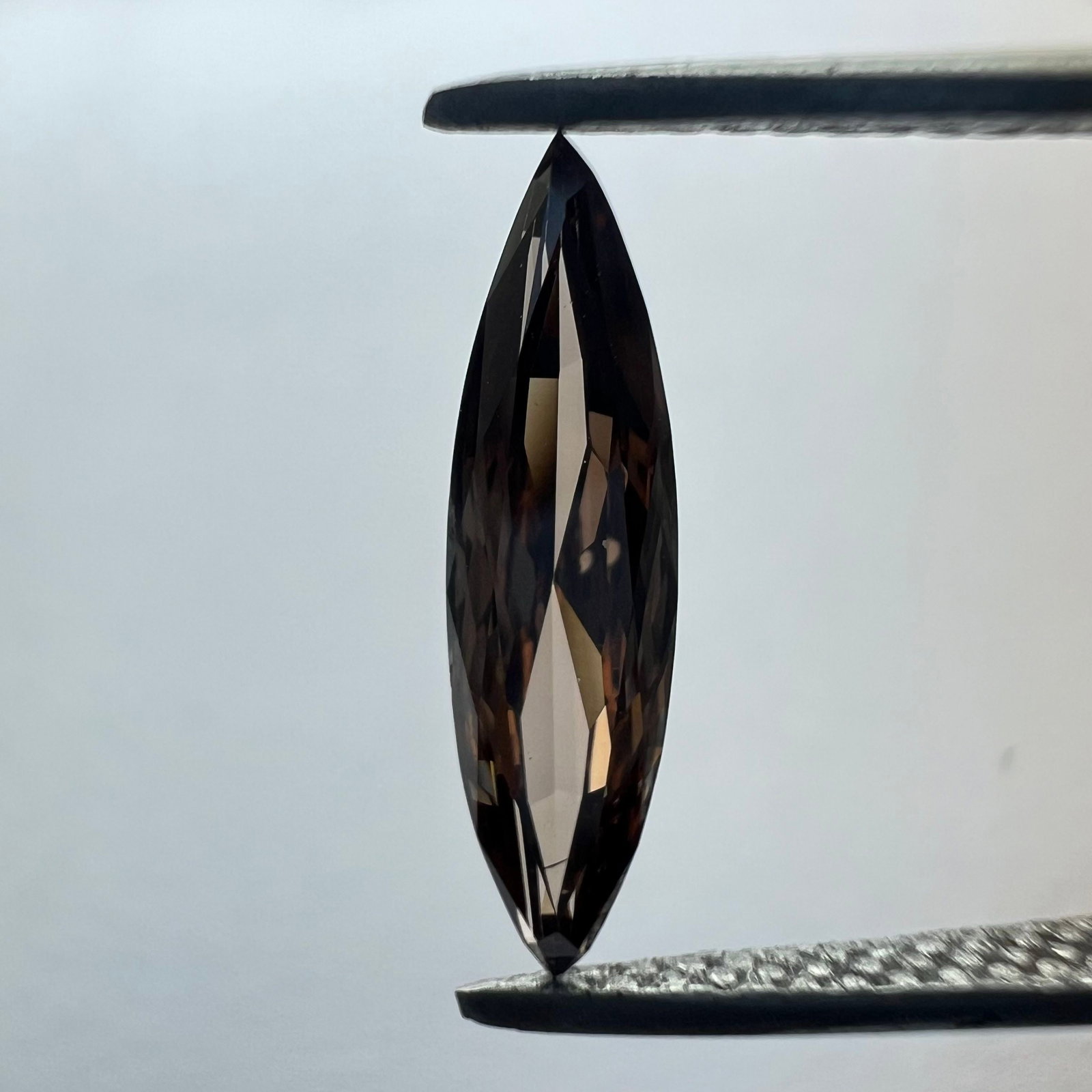 Loose Diamond - MARQUISE 0.68ct Brown VS2: Loose Diamond - MARQUISE 0.68ct Brown VS2 Source: This is a real non-mined Diamond that has been grown in a lab Shape: MARQUISE Carats: 0.68 Color: Brown Certification: NONE PLEASE NOTE: Framed, Large