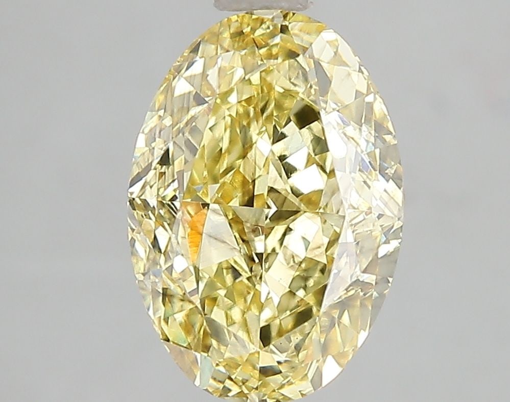 Loose Diamond - OVAL 3.02ct Fancy Intense Yellow SI1: Loose Diamond - OVAL 3.02ct Fancy Intense Yellow SI1 Source: This is a real non-mined Diamond that has been grown in a lab Shape: OVAL Carats: 3.02 Color: Fancy Intense Yellow Certification: IGI Video