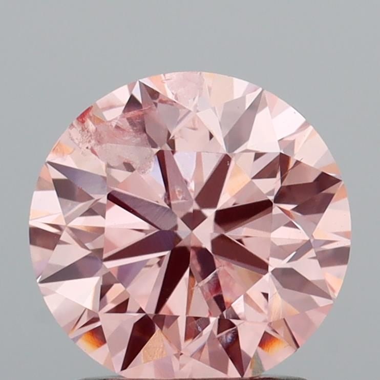Loose Diamond - ROUND 1.5ct Fancy Intense Pink I1: Loose Diamond - ROUND 1.5ct Fancy Intense Pink I1 Source: This is a real non-mined Diamond that has been grown in a lab Shape: ROUND Carats: 1.5 Color: Fancy Intense Pink Certification: IGI Video: