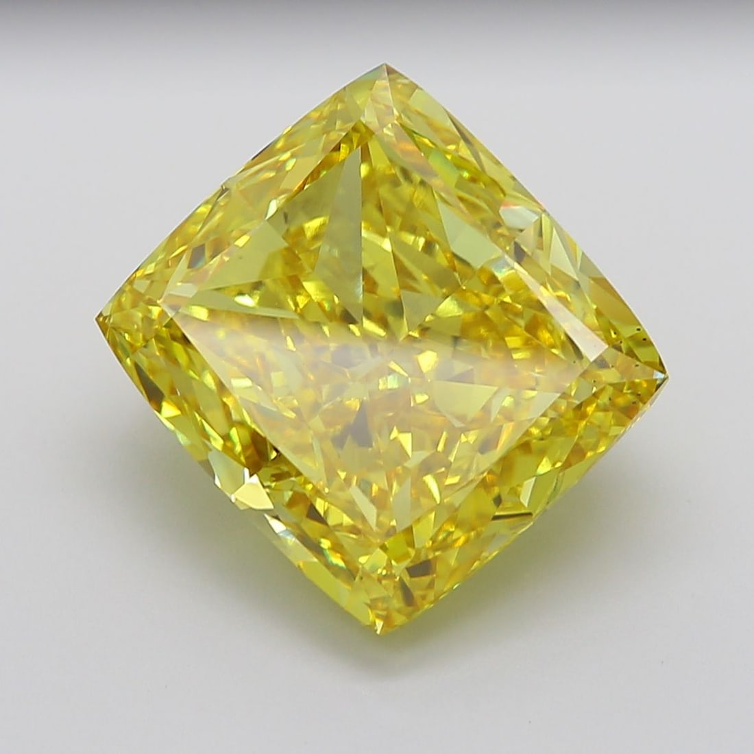 Loose Diamond - CUSHION MODIFIED 19.66ct Fancy Vivid Yellow VS2: Loose Diamond - CUSHION MODIFIED 19.66ct Fancy Vivid Yellow VS2 Source: This is a real non-mined Diamond that has been grown in a lab Shape: CUSHION MODIFIED Carats: 19.66 Color: Fancy Vivid Yellow Ce