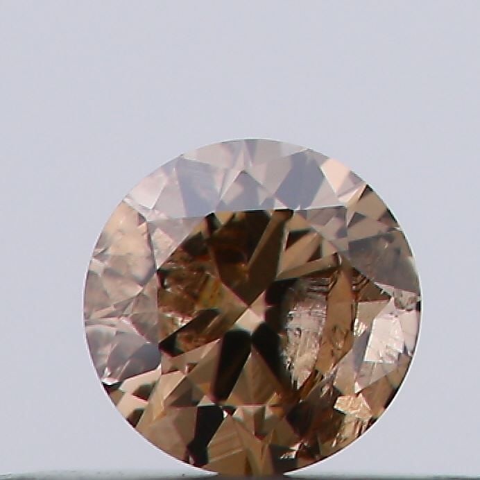 Loose Diamond - ROUND 0.19ct Fancy Brown I2: Loose Diamond - ROUND 0.19ct Fancy Brown I2 Source: Natural Shape: ROUND Carats: 0.19 Color: Fancy Brown Certification: NONE Video: