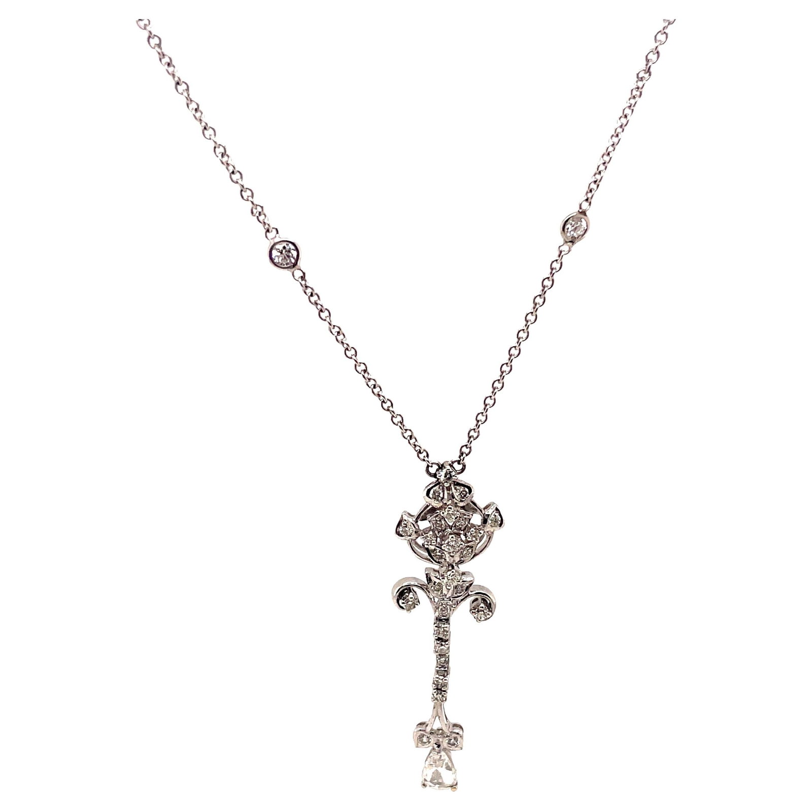 Elegant Art Deco 1.97ct Diamond Drop Necklace in 18k White Gold: Elegant Art Deco 1.97ct Diamond Drop Necklace in 18k White Gold This exquisite Art Deco style necklace features a stunning combination of pear and round diamonds totaling 1.97 carats, showcasing appro