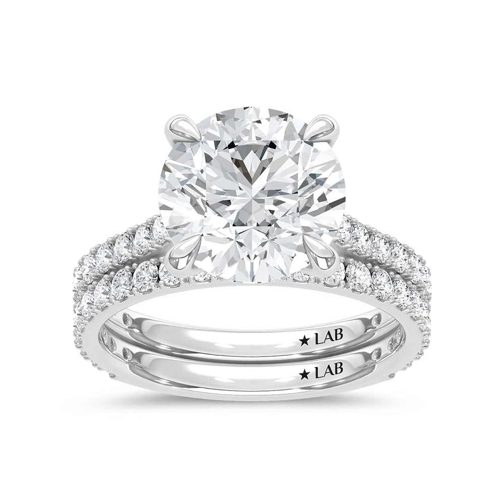 14K White Gold Lab Grown Diamond 5 1/2 Ct.Tw. Bridal Ring: 14K White Gold Lab Grown Diamond 5 1/2 Ct.Tw. Bridal Ring 14k White Gold Stone Color: D-f Stone Clarity: Vs Each ring is presented in standard size 6.5. Complimentary resizing is available between siz