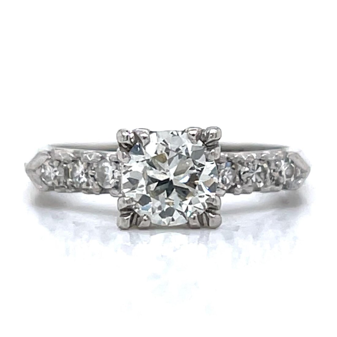 Platinum Engagement Ring with 0.90 Carat European Cut Diamond Art Deco Era: Platinum Engagement Ring with 0.90 Carat European Cut Diamond Art Deco Era This Art Deco engagement ring is crafted in platinum and features a central European-cut diamond of approximately 0.90 carats