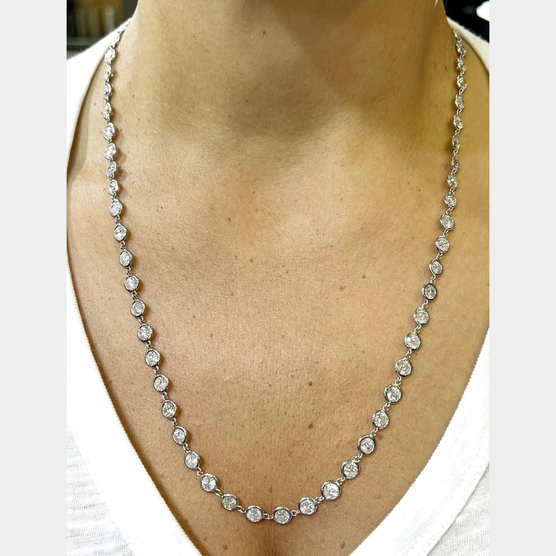 Platinum 26.70 Ct Diamond by the Yard Necklace 64 Diamonds: Platinum 26.70 Ct Diamond by the Yard Necklace 64 Diamonds This exquisite Platinum Diamond by the Yard Necklace features a stunning total of 64 diamonds, weighing approximately 26.70 Ct, with H-J colo