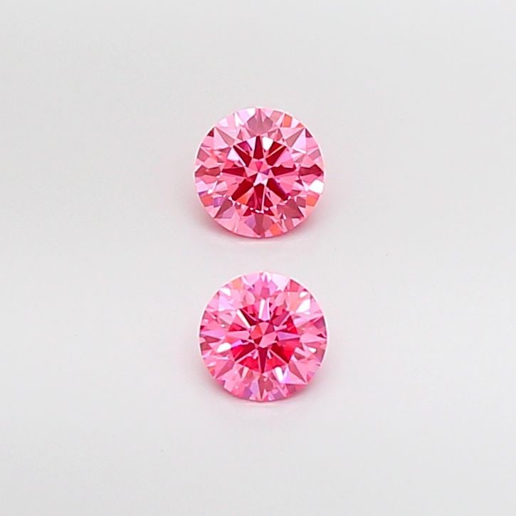 Ideal Loose Diamond - ROUND 0.5ct Fancy Vivid Pink VVS2: Ideal Loose Diamond - ROUND 0.5ct Fancy Vivid Pink VVS2 Source: This is a real non-mined Diamond that has been grown in a lab Shape: ROUND Carats: 0.5 Color: Fancy Vivid Pink Certification: IGI Video: