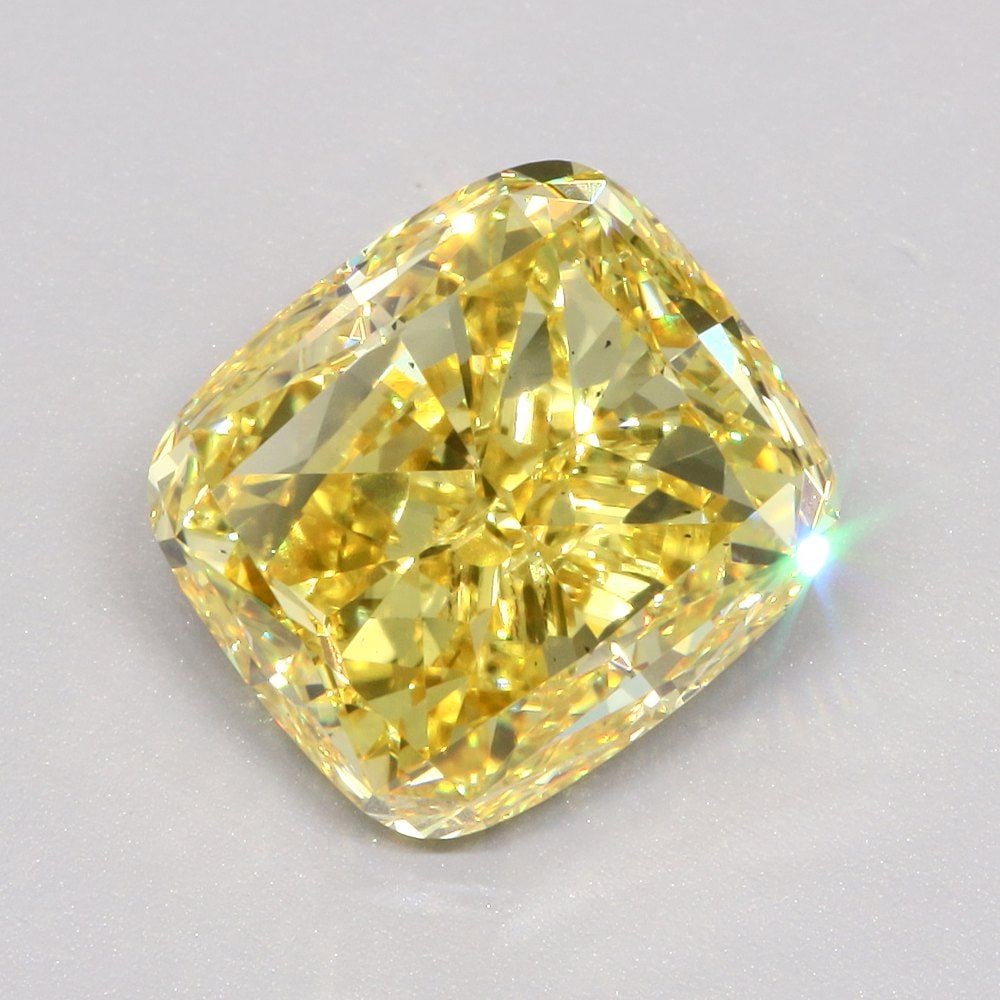 Loose Diamond - CUSHION MODIFIED 5.0ct Fancy Vivid Yellow SI1: Loose Diamond - CUSHION MODIFIED 5.0ct Fancy Vivid Yellow SI1 Source: This is a real non-mined Diamond that has been grown in a lab Shape: CUSHION MODIFIED Carats: 5.0 Color: Fancy Vivid Yellow Certif