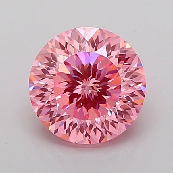 Loose Diamond - ROUND 1.56ct Fancy Vivid Pink VS1: Loose Diamond - ROUND 1.56ct Fancy Vivid Pink VS1 Source: This is a real non-mined Diamond that has been grown in a lab Shape: ROUND Carats: 1.56 Color: Fancy Vivid Pink Certification: IGI Video: