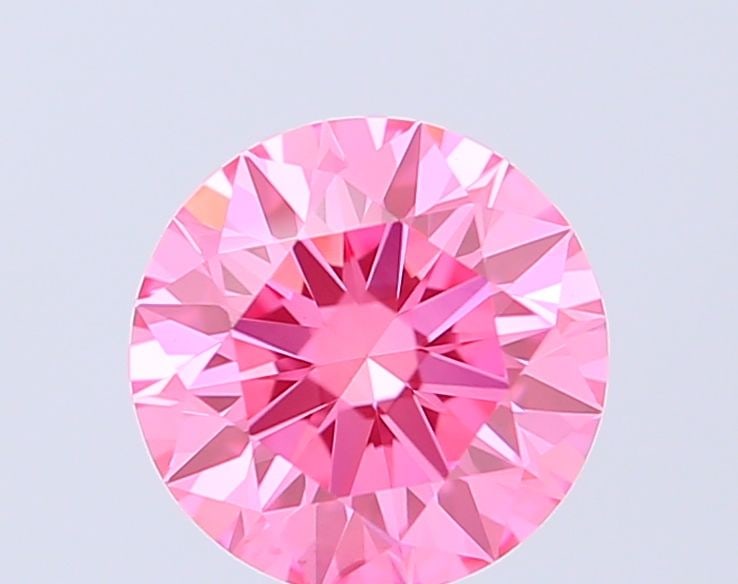 Ideal Loose Diamond - ROUND 0.72ct Fancy Vivid Pink VVS2: Ideal Loose Diamond - ROUND 0.72ct Fancy Vivid Pink VVS2 Source: This is a real non-mined Diamond that has been grown in a lab Shape: ROUND Carats: 0.72 Color: Fancy Vivid Pink Certification: IGI Vide