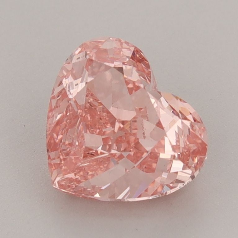 Loose Diamond - HEART 1.74ct Fancy Vivid Pink VS1: Loose Diamond - HEART 1.74ct Fancy Vivid Pink VS1 Source: This is a real non-mined Diamond that has been grown in a lab Shape: HEART Carats: 1.74 Color: Fancy Vivid Pink Certification: IGI Video: