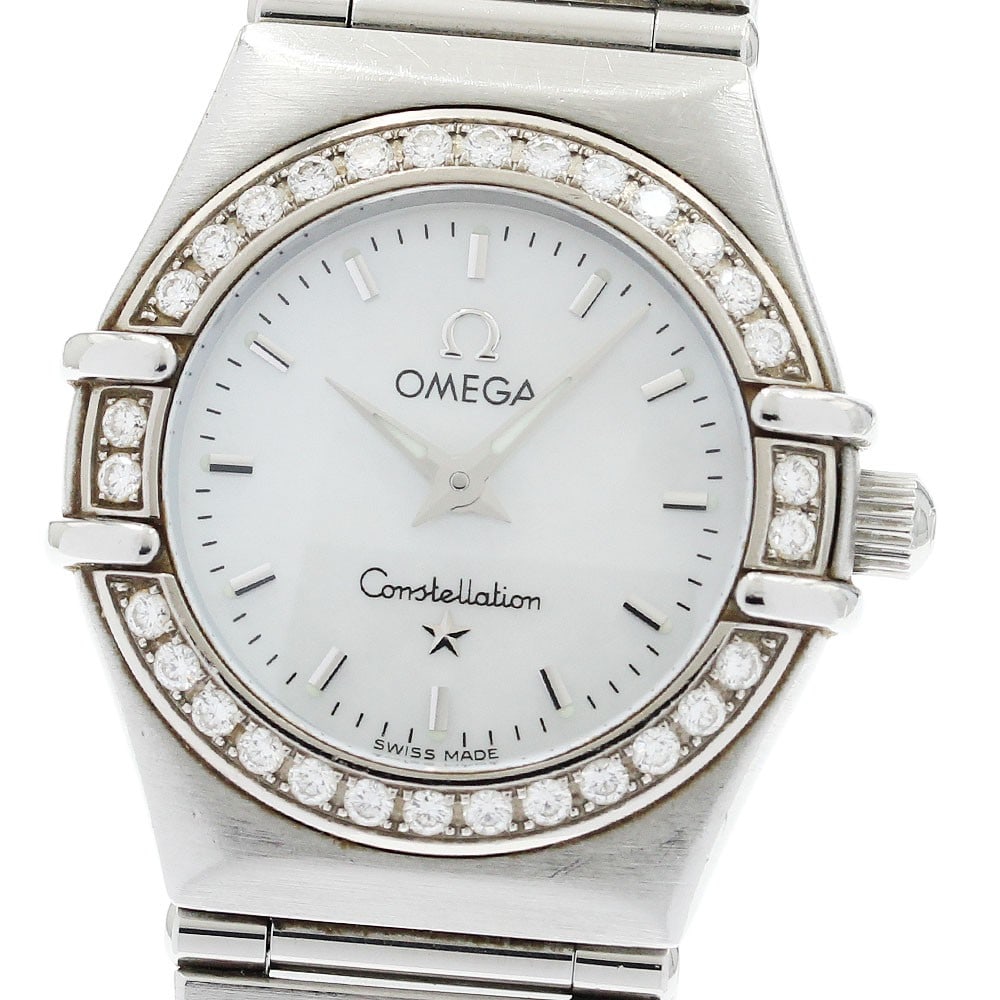 Omega Constellation 1466.71 Quartz Ladies Diamond Bezel Watch: Omega Constellation 1466.71 Quartz Ladies Diamond Bezel Watch This OMEGA Constellation ladies wristwatch features a stainless steel case and bracelet, complemented by a diamond-set bezel and a white m