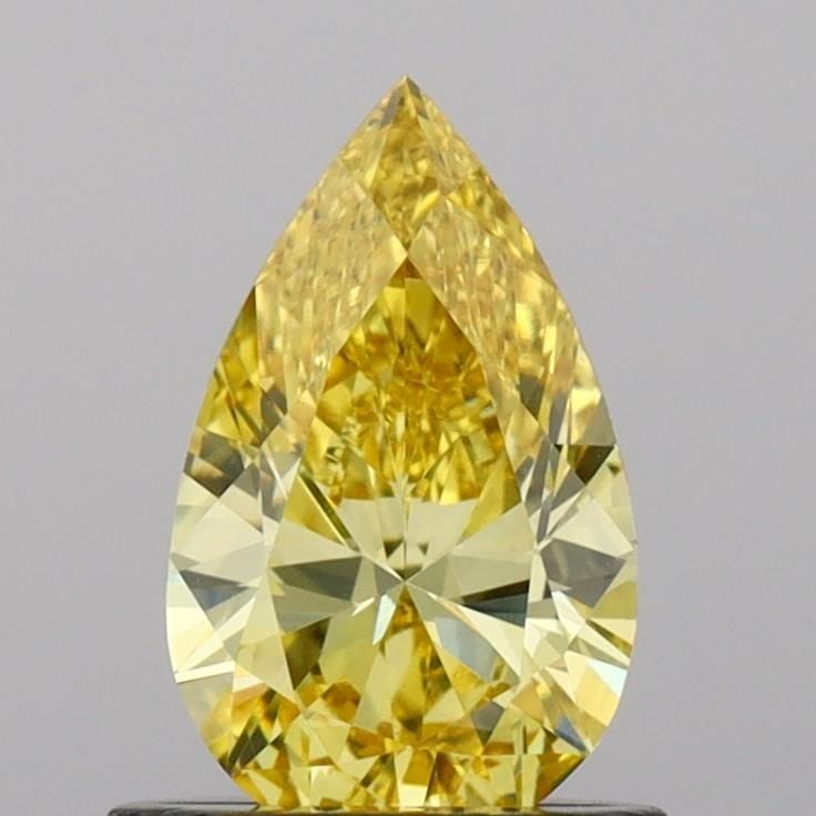 Loose Diamond - PEAR 0.77ct Fancy Vivid Yellow VVS2: Loose Diamond - PEAR 0.77ct Fancy Vivid Yellow VVS2 Source: This is a real non-mined Diamond that has been grown in a lab Shape: PEAR Carats: 0.77 Color: Fancy Vivid Yellow Certification: IGI Video: