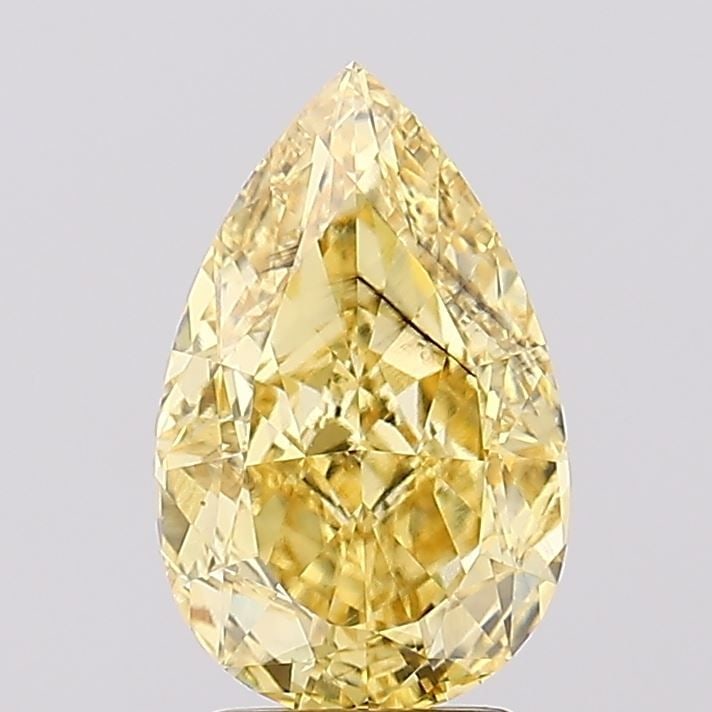 Loose Diamond - PEAR 3.17ct Fancy Vivid Yellow SI1: Loose Diamond - PEAR 3.17ct Fancy Vivid Yellow SI1 Source: This is a real non-mined Diamond that has been grown in a lab Shape: PEAR Carats: 3.17 Color: Fancy Vivid Yellow Certification: IGI Video:
