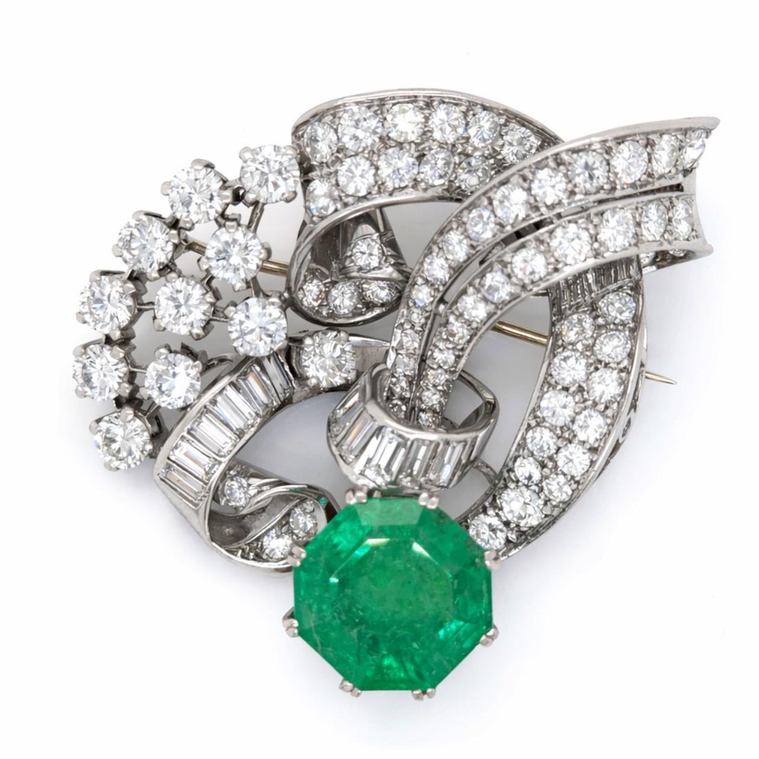 Platinum Art Deco Brooch With GIA 9.77 Ct Emerald And Diamonds: Platinum Art Deco Brooch With GIA 9.77 Ct Emerald And Diamonds This Art Deco brooch is crafted in platinum and features a GIA certified 9.77 carat emerald as its centerpiece. The brooch is further