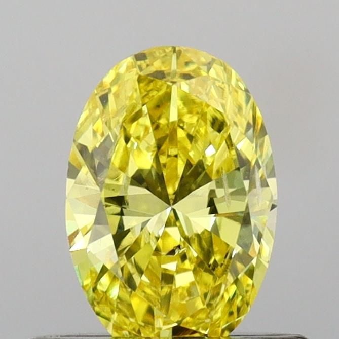 Loose Diamond - OVAL 0.55ct Fancy Vivid Yellow SI2: Loose Diamond - OVAL 0.55ct Fancy Vivid Yellow SI2 Source: This is a real non-mined Diamond that has been grown in a lab Shape: OVAL Carats: 0.55 Color: Fancy Vivid Yellow Certification: IGI Video: