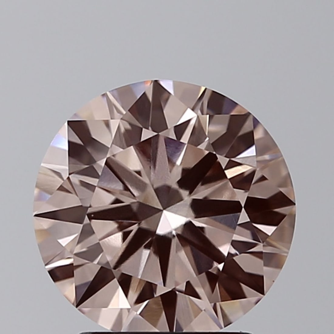 Loose Diamond - ROUND 2.05ct Fancy Pink VS1: Loose Diamond - ROUND 2.05ct Fancy Pink VS1 Source: This is a real non-mined Diamond that has been grown in a lab Shape: ROUND Carats: 2.05 Color: Fancy Pink Certification: IGI Video: