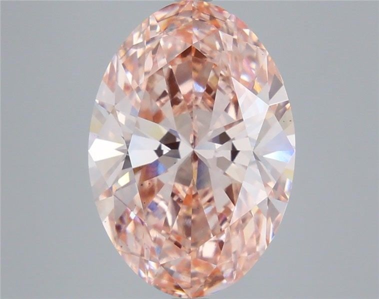 Loose Diamond - OVAL 7.04ct Fancy Vivid Pink VS2: Loose Diamond - OVAL 7.04ct Fancy Vivid Pink VS2 Source: This is a real non-mined Diamond that has been grown in a lab Shape: OVAL Carats: 7.04 Color: Fancy Vivid Pink Certification: IGI Video: