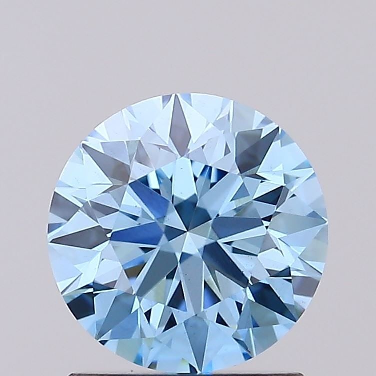 Loose Diamond - ROUND 1.28ct Fancy Vivid Blue VS1: Loose Diamond - ROUND 1.28ct Fancy Vivid Blue VS1 Source: This is a real non-mined Diamond that has been grown in a lab Shape: ROUND Carats: 1.28 Color: Fancy Vivid Blue Certification: IGI Video: