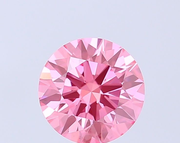Ideal Loose Diamond - ROUND 1.0ct Fancy Vivid Pink VS1: Ideal Loose Diamond - ROUND 1.0ct Fancy Vivid Pink VS1 Source: This is a real non-mined Diamond that has been grown in a lab Shape: ROUND Carats: 1.0 Color: Fancy Vivid Pink Certification: IGI Video: