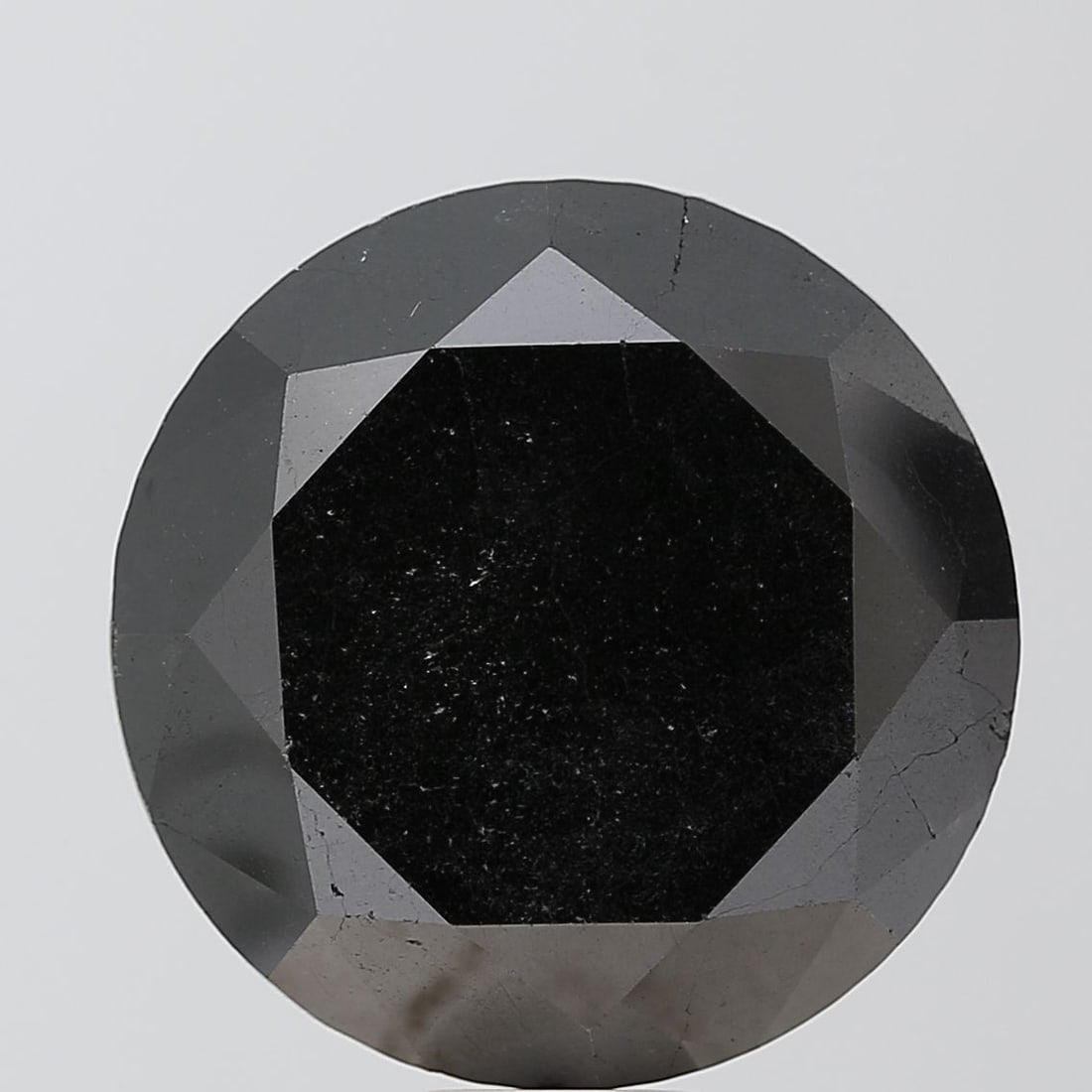 Loose Diamond - ROUND 20.83ct Black VS1: Loose Diamond - ROUND 20.83ct Black VS1 Source: Natural Shape: ROUND Carats: 20.83 Color: Black Certification: NONE Video: