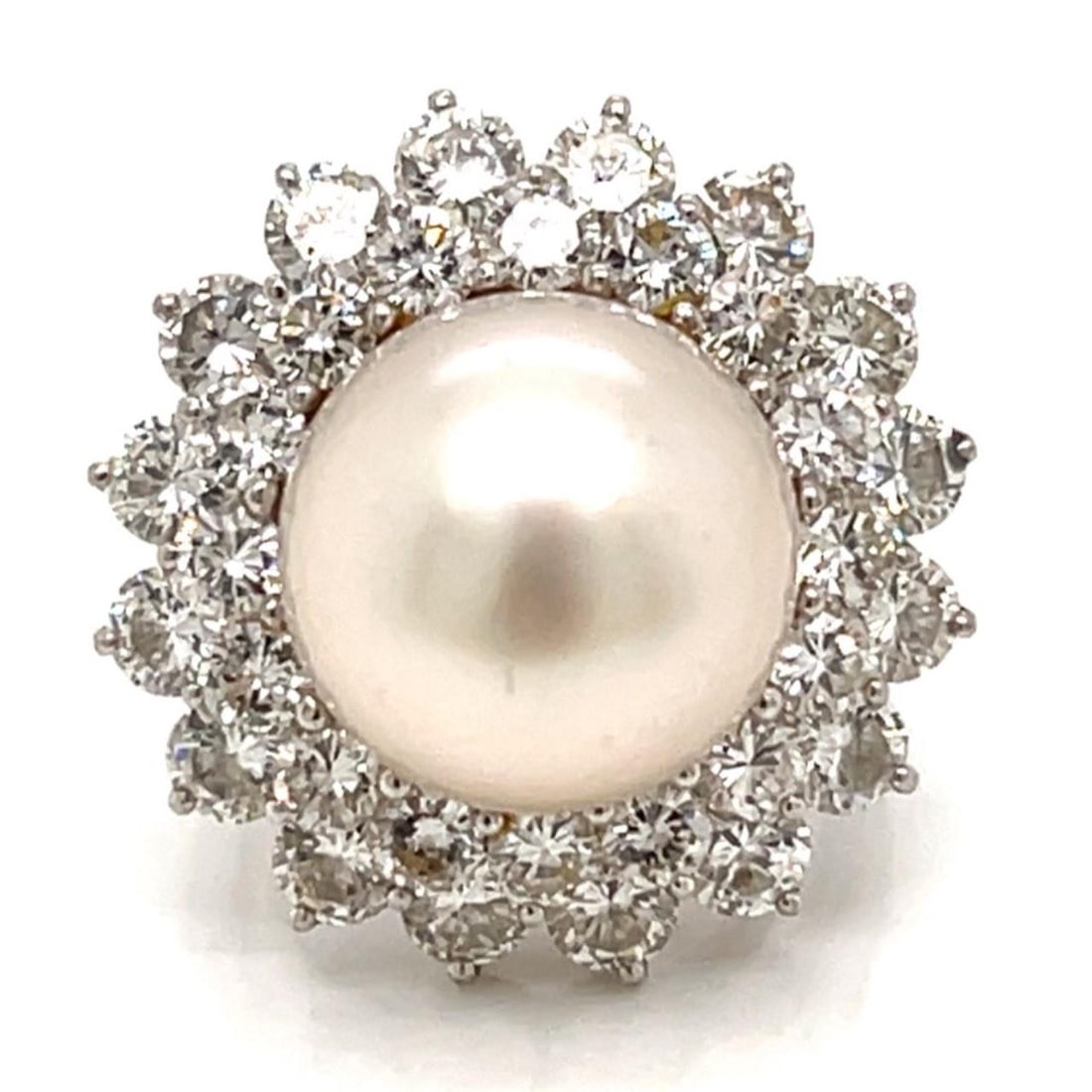 South Sea Pearl and 32 Diamond 18K White Gold Ring 12.6mm Size 3.5: South Sea Pearl and 32 Diamond 18K White Gold Ring 12.6mm Size 3.5 This ring features a 12.6mm South Sea pearl set in 18K white gold, accented by 32 diamonds with an approximate total weight of 3.80 c