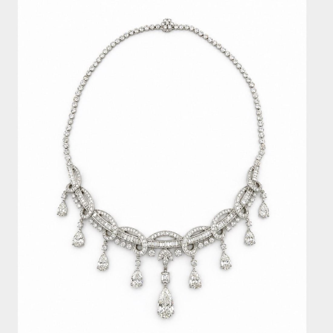 Platinum 1950s Diamond Necklace Pear Center 16 Inches: Platinum 1950s Diamond Necklace Pear Center 16 Inches This elegant 1950s necklace is crafted from platinum and features a striking pear-shaped center diamond weighing approximately 4.00 carats with K 