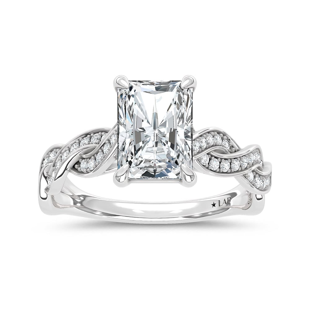 14K White Gold Lab Grown Diamond 2 1/5 Ct.Tw. Radiant Shape Twisted Shank Engagement Ring (Center 2: 14K White Gold Lab Grown Diamond 2 1/5 Ct.Tw. Radiant Shape Twisted Shank Engagement Ring (Center 2 ctw) This elegant diamond engagement ring crafted in 14k White gold, features a Radiant Shape center