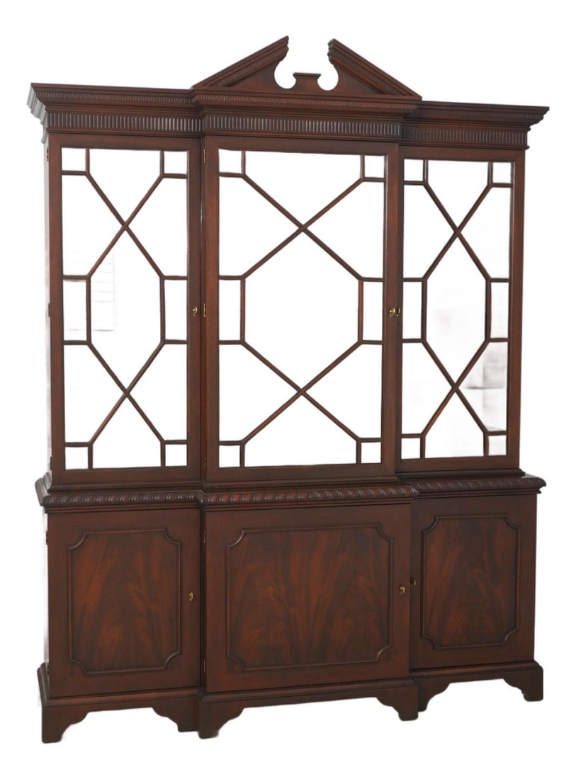 Mahogany China Cabinet Chippendale Style Historic Charleston Collection by Baker: Mahogany China Cabinet Chippendale Style Historic Charleston Collection by Baker This Baker Chippendale Historic Charleston mahogany china cabinet features a two-piece construction and is crafted