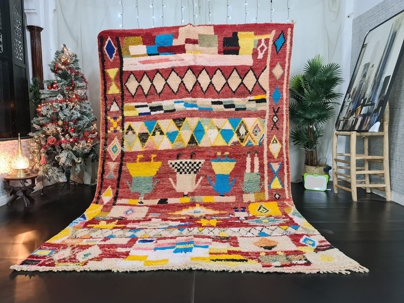 Handmade Moroccan Berber Wool Rug 9.84 x 6.56 Feet: Handmade Moroccan Berber Wool Rug 9.84 x 6.56 Feet Discover the stunning beauty of this Moroccan Berber Handmade Wool rug, meticulously crafted to showcase a vibrant array of colors and intricate deta