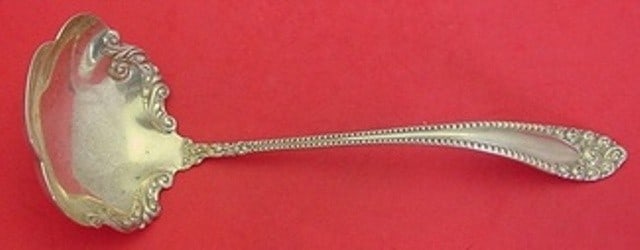 International Sterling Silver Kenilworth Oyster Ladle 9.5": International Sterling Silver Kenilworth Oyster Ladle 9.5" This exquisite 9 1/2" oyster ladle features the elegant Kenilworth pattern by International Sterling. Crafted from high-quality sterling silv