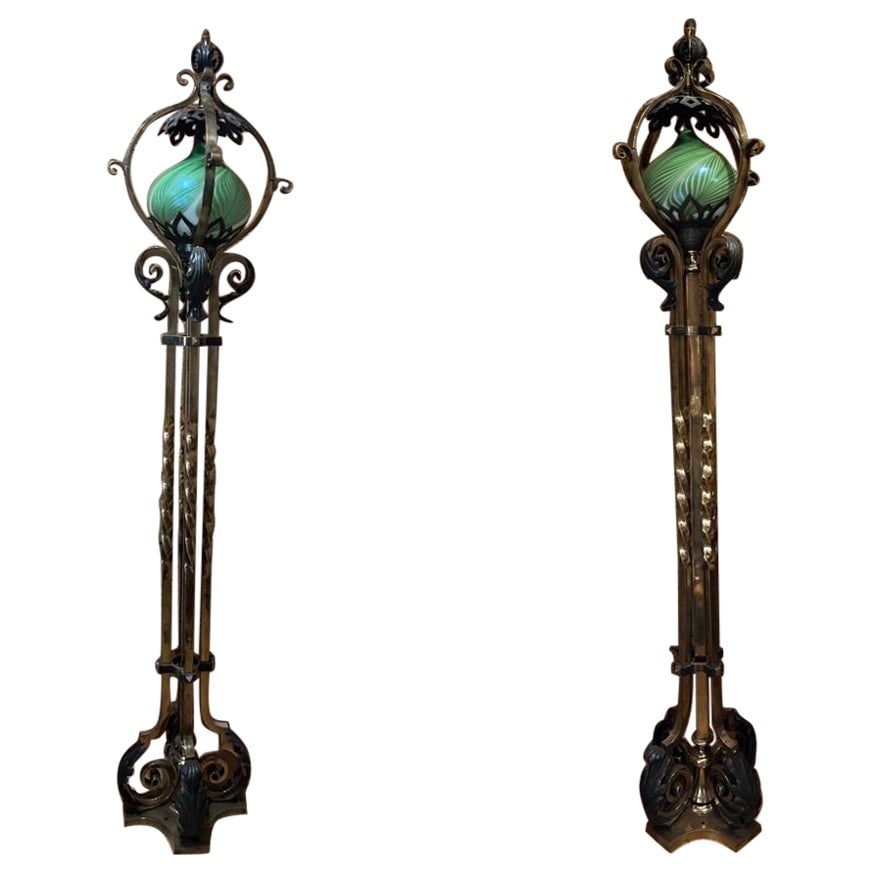 19th Century Russian Neoclassical Bronze and Iron Floor Lamps Set of 2: 19th Century Russian Neoclassical Bronze and Iron Floor Lamps Set of 2 This exquisite pair of 19th-century floor lamps showcases the elegance of Russian Neoclassical design. Each lamp stands at a heig