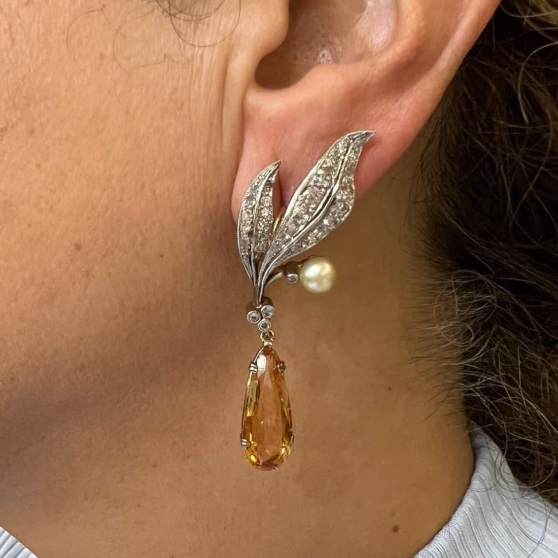 1950s 18K Gold Platinum GIA Certified Pearl Topaz Earrings 2.25 Inch: 1950s 18K Gold Platinum GIA Certified Pearl Topaz Earrings 2.25 Inch Discover these exquisite 1950's earrings crafted from 18K gold and platinum, featuring both natural pearls and topaz. These stunnin