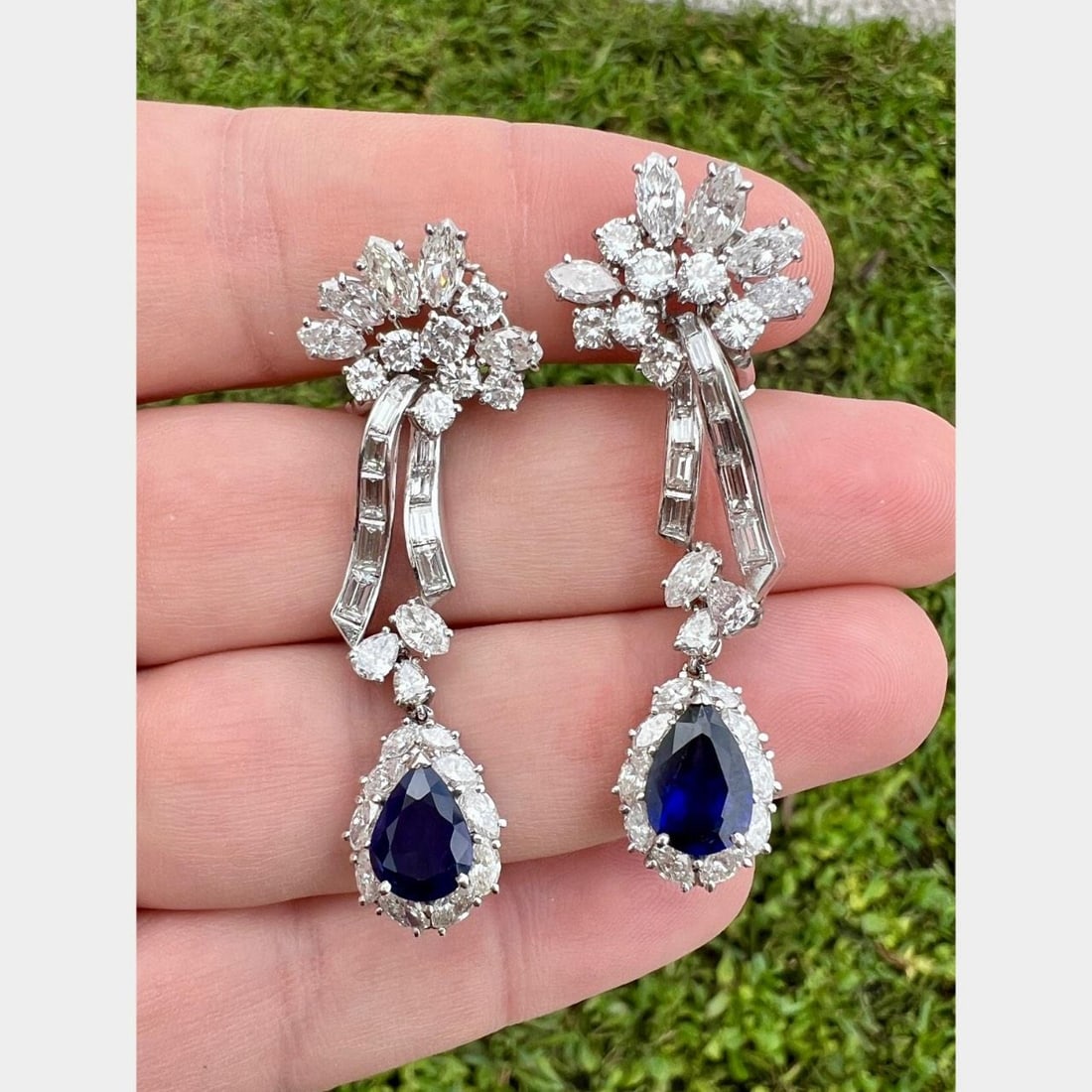 Platinum Art Deco Earrings with Sapphires and Diamonds 2 Inch: Platinum Art Deco Earrings with Sapphires and Diamonds 2 Inch These Art Deco earrings are crafted from platinum and feature two sapphires with a total weight of approximately 4.00 carats. They are acc