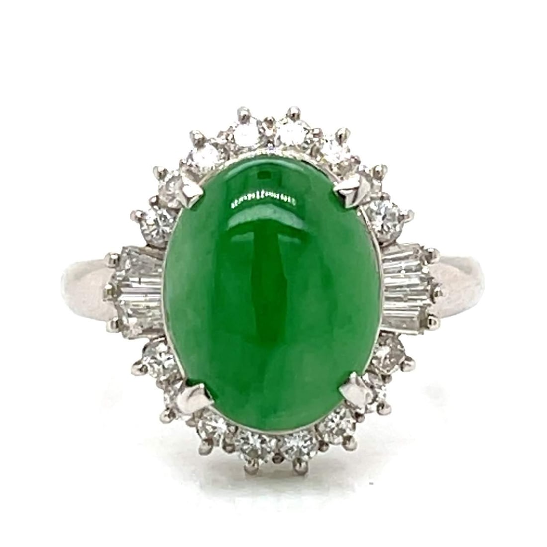 Platinum GIA Certified 4.57 Ct Jade and 22 Diamond Ring: Platinum GIA Certified 4.57 Ct Jade and 22 Diamond Ring This exquisite Platinum ring features a stunning GIA Certified Jade weighing 4.57 Ct. The ring is adorned with 22 sparkling Diamonds totaling 0.
