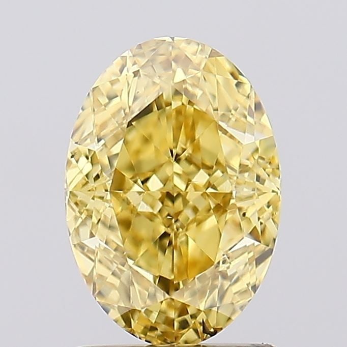 Loose Diamond - OVAL 1.71ct Fancy Vivid Yellow VS2: Loose Diamond - OVAL 1.71ct Fancy Vivid Yellow VS2 Source: This is a real non-mined Diamond that has been grown in a lab Shape: OVAL Carats: 1.71 Color: Fancy Vivid Yellow Certification: IGI Video: