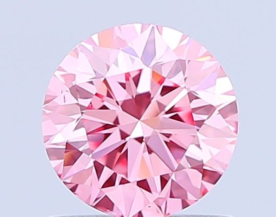Loose Diamond - ROUND 1.0ct Fancy Vivid Pink VS2: Loose Diamond - ROUND 1.0ct Fancy Vivid Pink VS2 Source: This is a real non-mined Diamond that has been grown in a lab Shape: ROUND Carats: 1.0 Color: Fancy Vivid Pink Certification: IGI Video: