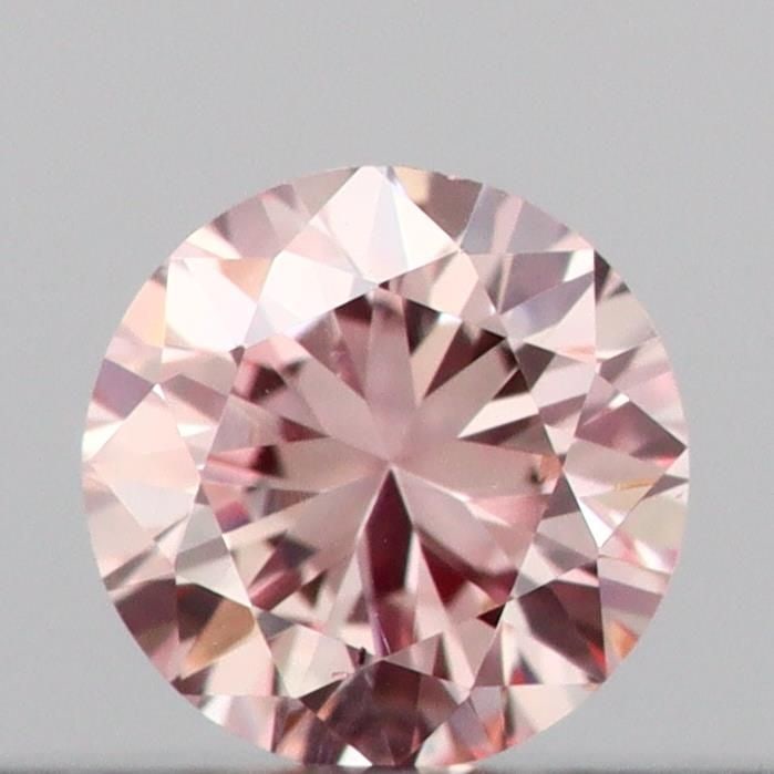 Loose Diamond - ROUND 0.12ct Fancy Light Pink VS1: Loose Diamond - ROUND 0.12ct Fancy Light Pink VS1 Source: This is a real non-mined Diamond that has been grown in a lab Shape: ROUND Carats: 0.12 Color: Fancy Light Pink Certification: IGI Video: