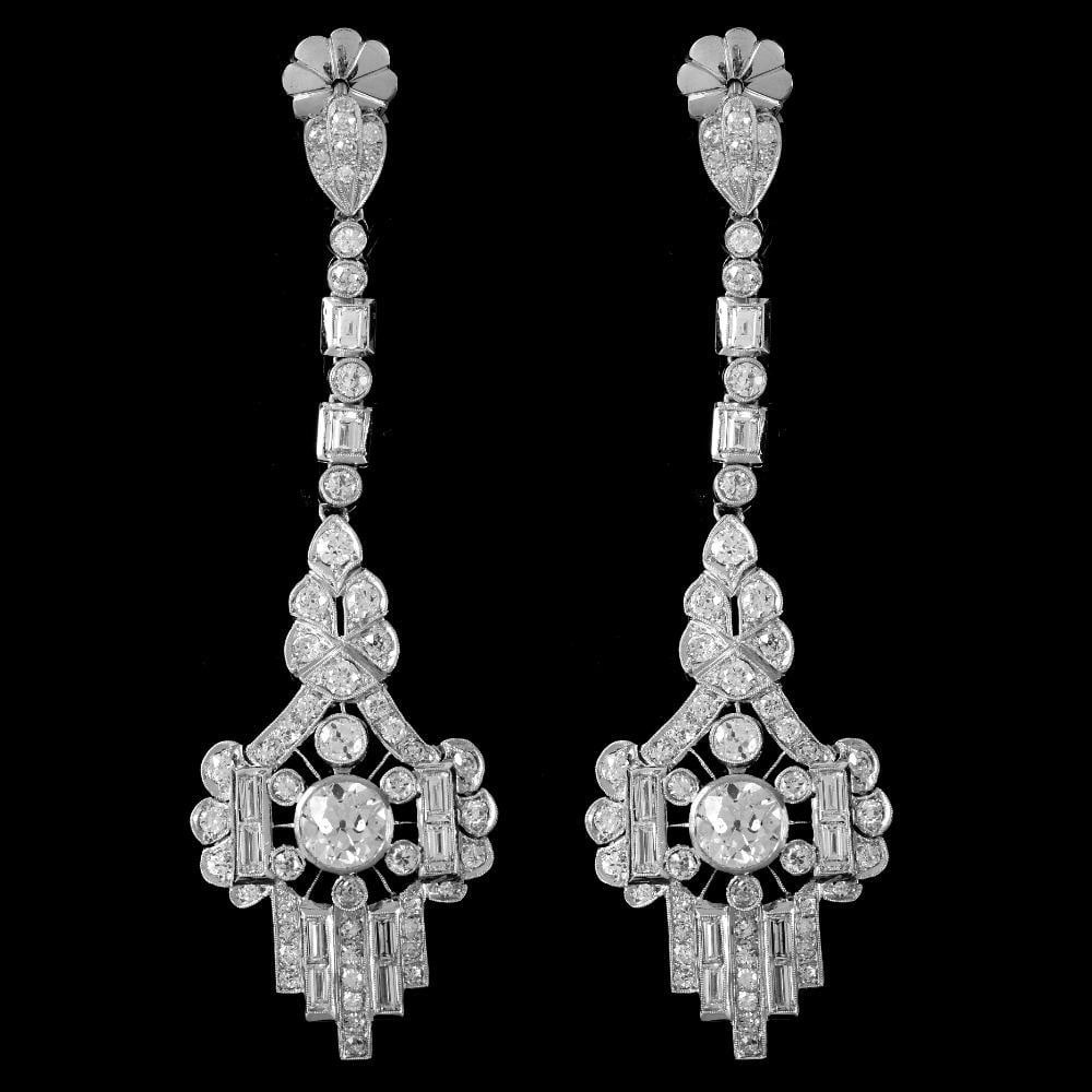 Stunning 11.65 Ct Platinum Chandelier Earrings with European Cut Diamonds: Stunning 11.65 Ct Platinum Chandelier Earrings with European Cut Diamonds Elevate your elegance with these stunning 11.65 Ct Diamond Chandelier Earrings. Featuring two exquisite European Cut Diamonds 