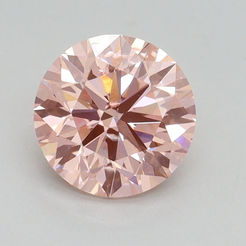 Loose Diamond - ROUND 1.42ct Fancy Intense Pink SI2: Loose Diamond - ROUND 1.42ct Fancy Intense Pink SI2 Source: This is a real non-mined Diamond that has been grown in a lab Shape: ROUND Carats: 1.42 Color: Fancy Intense Pink Certification: IGI Video: