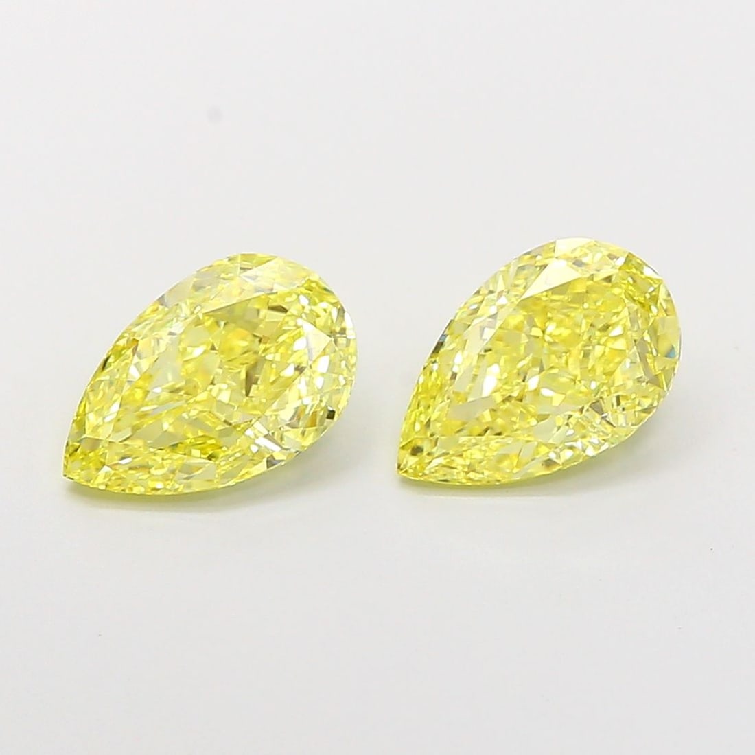 Loose Diamond - PEAR 1.56ct Fancy Intense Yellow VVS2: Loose Diamond - PEAR 1.56ct Fancy Intense Yellow VVS2 Source: This is a real non-mined Diamond that has been grown in a lab Shape: PEAR Carats: 1.56 Color: Fancy Intense Yellow Certification: IGI Vide