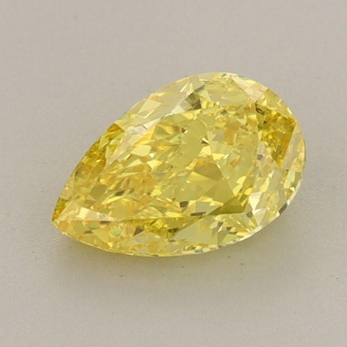 Loose Diamond - PEAR 0.82ct Fancy Vivid Yellow VS1: Loose Diamond - PEAR 0.82ct Fancy Vivid Yellow VS1 Source: This is a real non-mined Diamond that has been grown in a lab Shape: PEAR Carats: 0.82 Color: Fancy Vivid Yellow Certification: IGI Video: