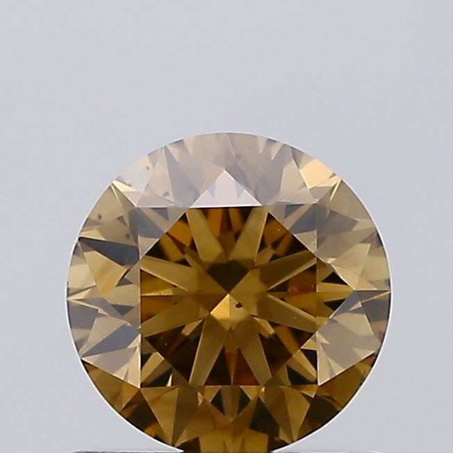 Loose Diamond - ROUND 0.7ct Fancy Brown VS2: Loose Diamond - ROUND 0.7ct Fancy Brown VS2 Source: Natural Shape: ROUND Carats: 0.7 Color: Fancy Brown Certification: NONE Video: