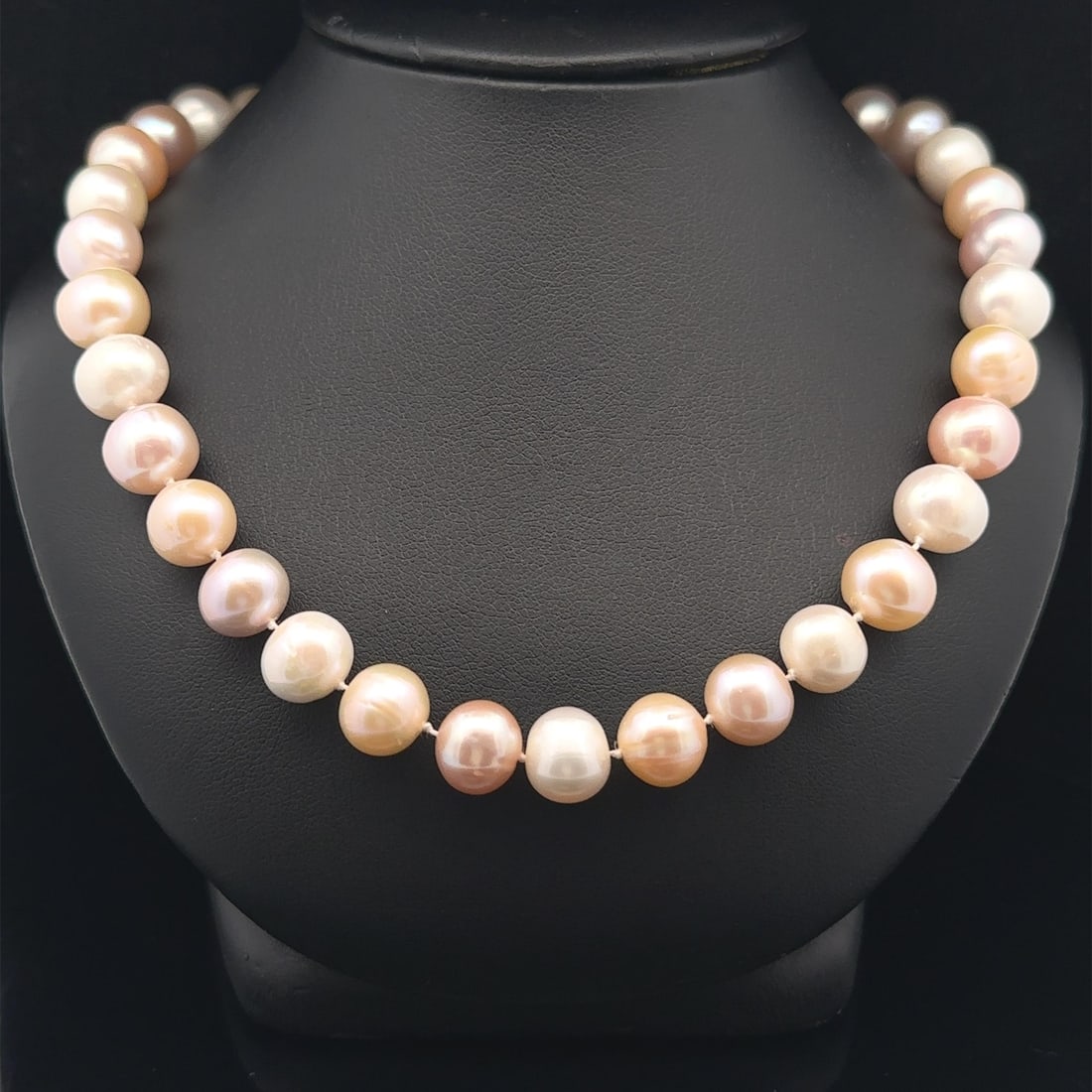 Elegant 4-9.1mm Pink Cultured Pearl Necklace 17" with 14k Yellow Gold Clasp: Elegant 4-9.1mm Pink Cultured Pearl Necklace 17" with 14k Yellow Gold Clasp This exquisite necklace showcases a stunning strand of 43 genuine cultured pearls, beautifully crafted in a roundish shape. 