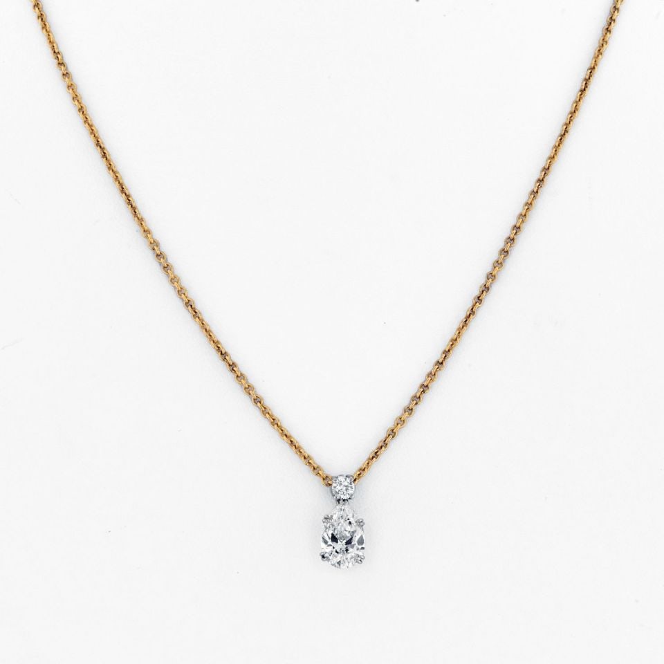 Verdura 2.51 Carat D VS1 Pear Diamond Pendant in Platinum & 18K Gold with GIA Certificate: Verdura 2.51 Carat D VS1 Pear Diamond Pendant in Platinum & 18K Gold with GIA Certificate Experience elegance with this stunning necklace featuring a captivating pendant set with a pear-shaped diamond